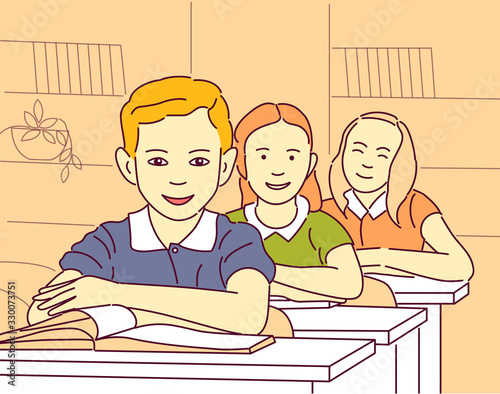 school pupils on lesson, girls and boy sitting at desk