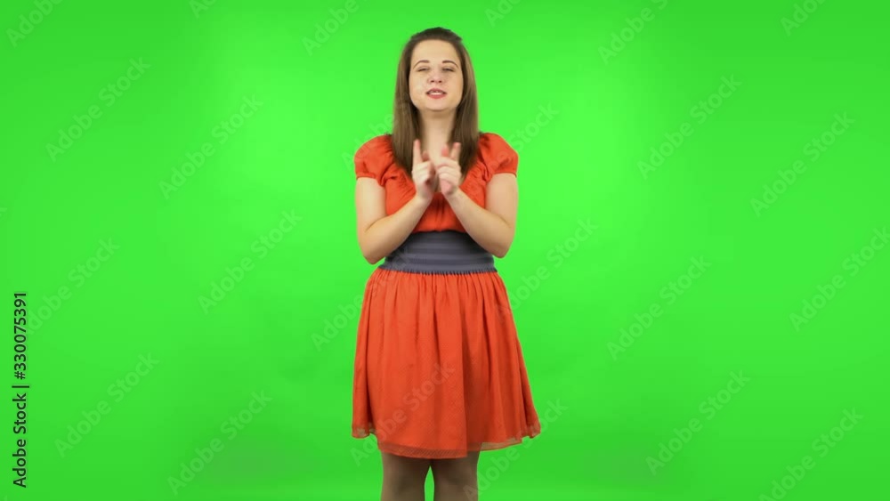 Cute girl is smiling and dancing funny. Green screen Cute girl is smiling and dancing funny. Green screen