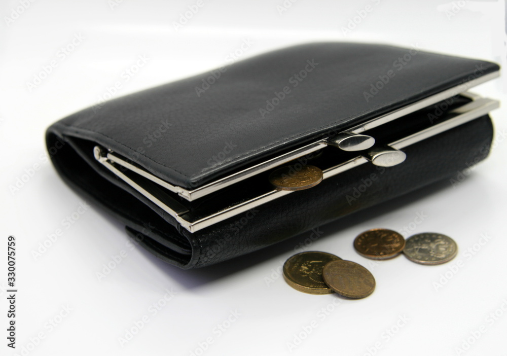 Black wallet with coins on a white background, crisis and poverty Black wallet with coins on a white background, crisis and poverty