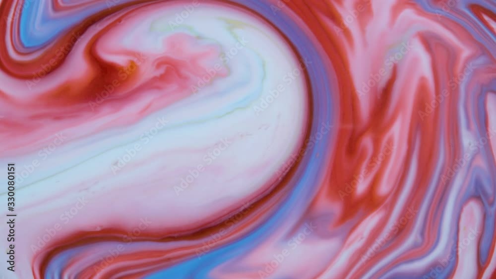 Marbling, multi-colored swirled, stone-like patterns. Paint floating, spreading on the surface of a liquid. Abstract fluid art, ink in motion. Magical marble texture. Ink bloom, blast, paint explosion