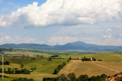 Asciano (SI), Italy - June 01, 2016: Typical scenary of Crete Senesi, Asciano, Siena, Tuscany, Italy photo