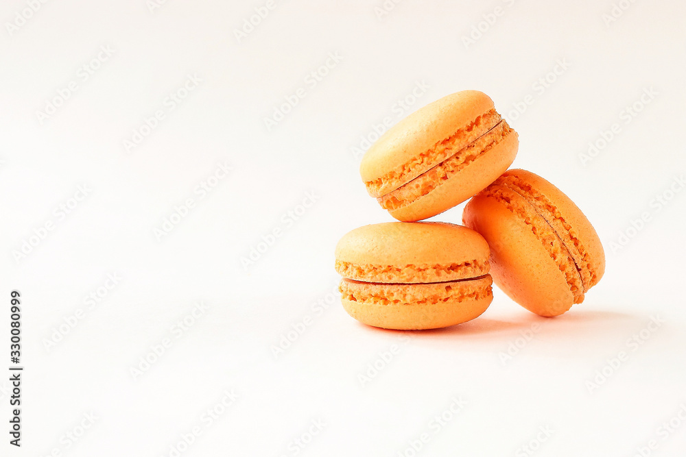 Macaroons Mango on a light background with space for text. Macaroons Mango on a light background with space for text.