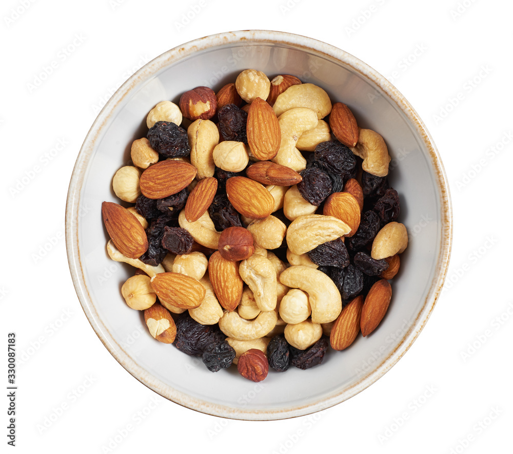 Natural healthy food in a bowl. Nuts and raisins Natural healthy food in a bowl. Nuts and raisins