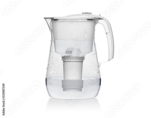 purified water in a filter jug isolated on white.