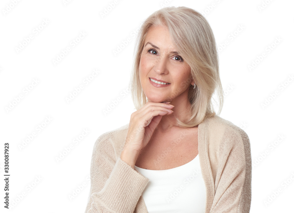 Smiling senior blonde woman portrait. Isolated Smiling senior blonde woman portrait. Isolated