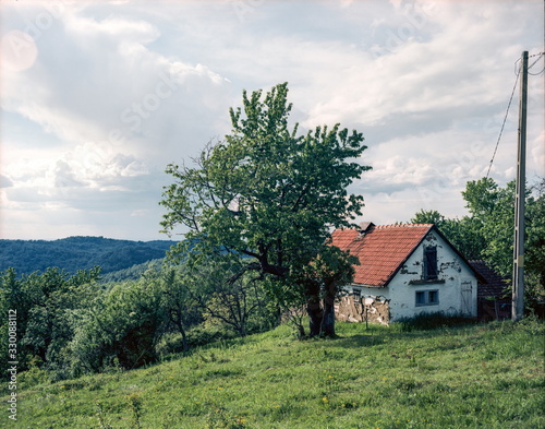 Old damaged house on a hill © Octavian