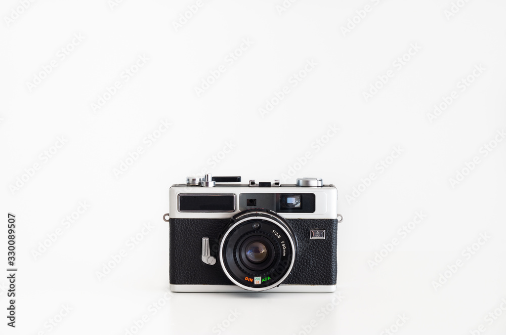 Old compact film camera brandless isolated