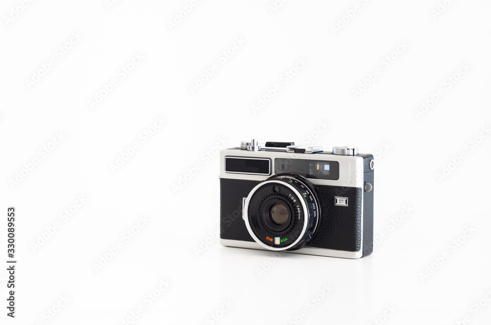 Old compact film camera brandless isolated