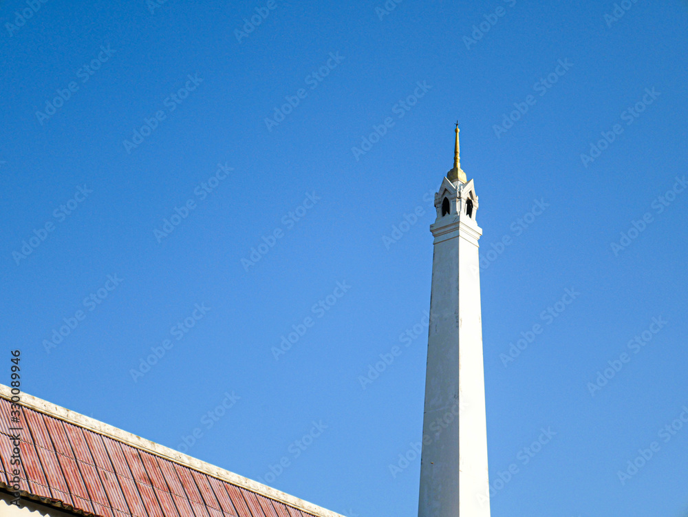 Obraz premium Crematory on blue sky background.