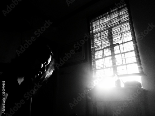 Sunlight Emerging In Darkroom Through Window