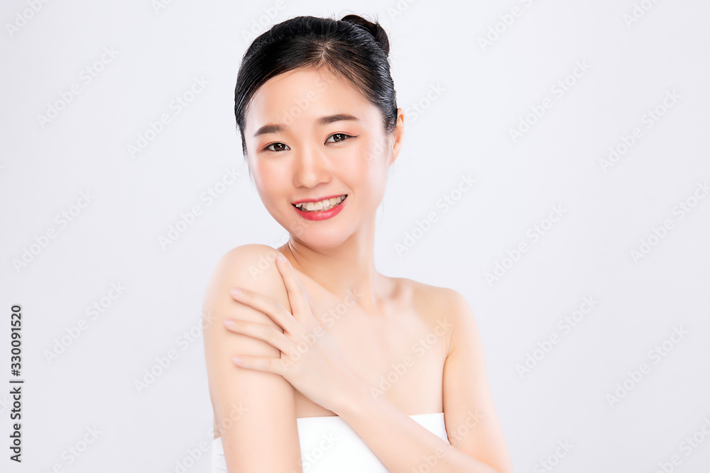 Beautiful Young Asian Woman with Clean Fresh Skin. Face care, Facial treatment, Cosmetology, beauty and healthy skin and cosmetic concept .woman beauty skin isolated on white background Beautiful Young Asian Woman with Clean Fresh Skin. Face care, Facial treatment, Cosmetology, beauty and healthy skin and cosmetic concept .woman beauty skin isolated on white background
