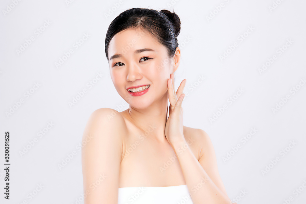 Beautiful Young Asian Woman with Clean Fresh Skin. Face care, Facial treatment, Cosmetology, beauty and healthy skin and cosmetic concept .woman beauty skin isolated on white background Beautiful Young Asian Woman with Clean Fresh Skin. Face care, Facial treatment, Cosmetology, beauty and healthy skin and cosmetic concept .woman beauty skin isolated on white background
