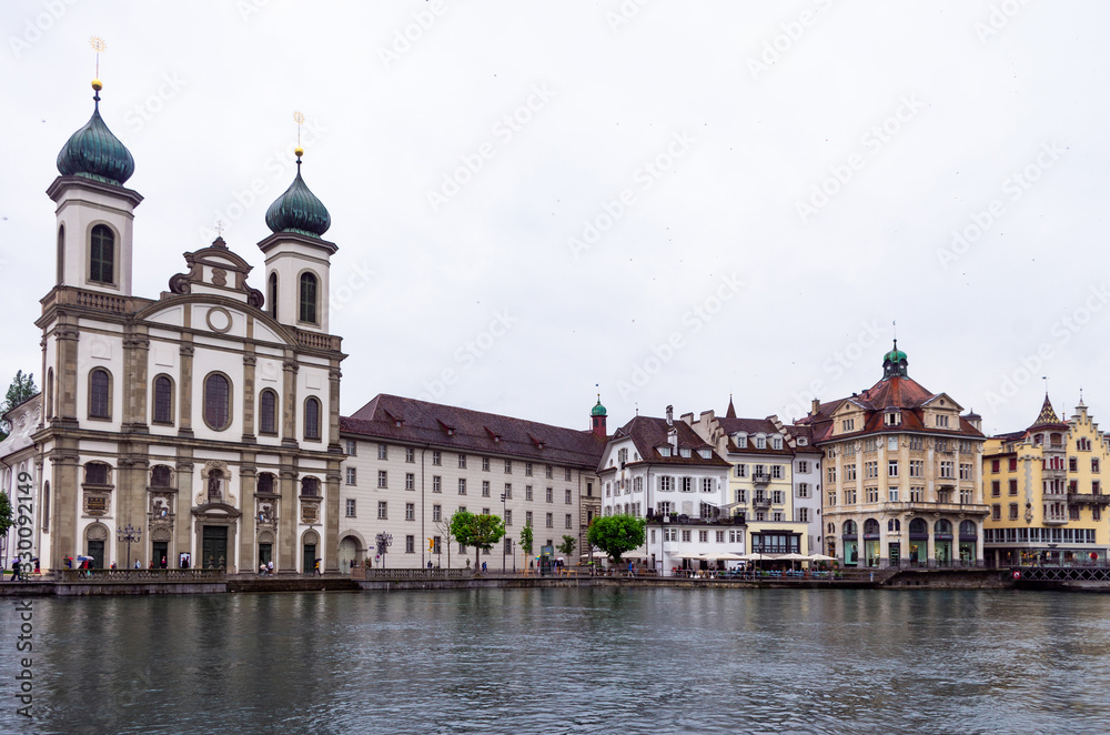 View of the Jesuit Chruch in Lucerne Switzerland from the other side of the Reuss river