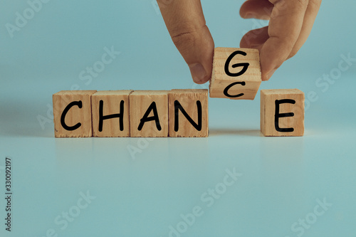 Hand flip wooden cube with word "change" to "chance", Personal development and career growth or change yourself concept