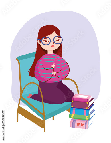 young woman wearing glasses with stacked books in floor, book day