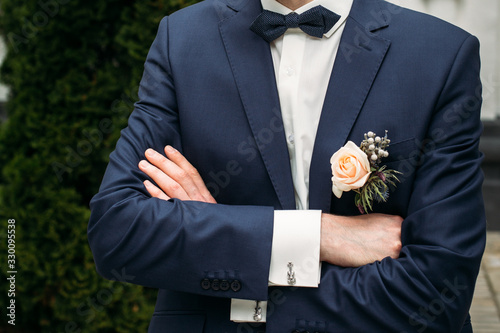 Boutonniere on the lapel of the groom