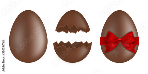 Chocolate easter eggs on white background. Whole egg, broken egg and egg with red bow.