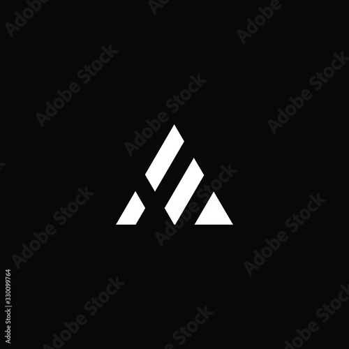  Minimal elegant monogram art logo. Outstanding professional trendy awesome artistic AE EA initial based Alphabet icon logo. Premium Business logo White color on black background photo
