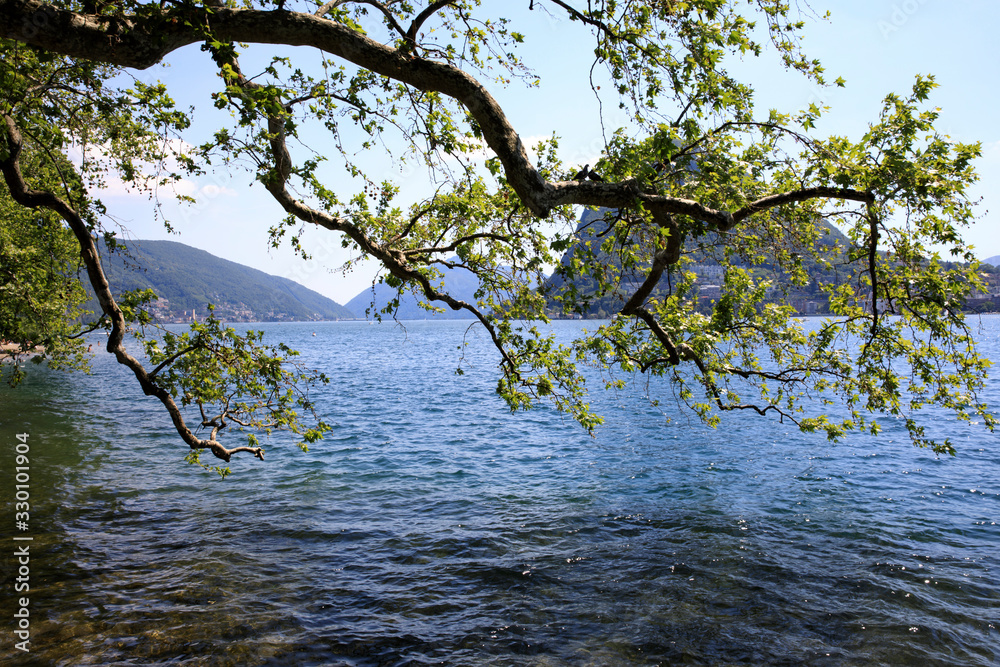 Lugano / Switzerland - June 01, 2019: Lugano lake view, Lugano, Switzerland, Europe Lugano / Switzerland - June 01, 2019: Lugano lake view, Lugano, Switzerland, Europe