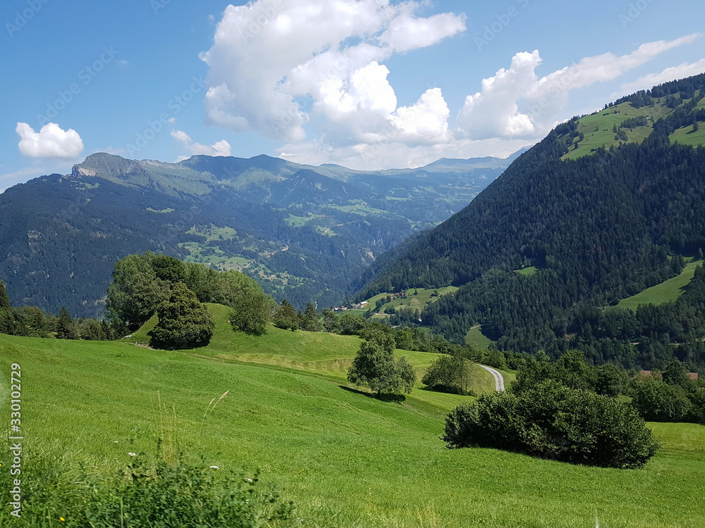 View from a mountain in the Swiss Alps in summer