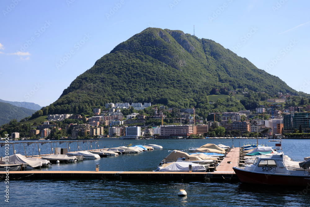 Lugano / Switzerland - June 01, 2019: Lugano lake view, Lugano, Switzerland, Europe Lugano / Switzerland - June 01, 2019: Lugano lake view, Lugano, Switzerland, Europe