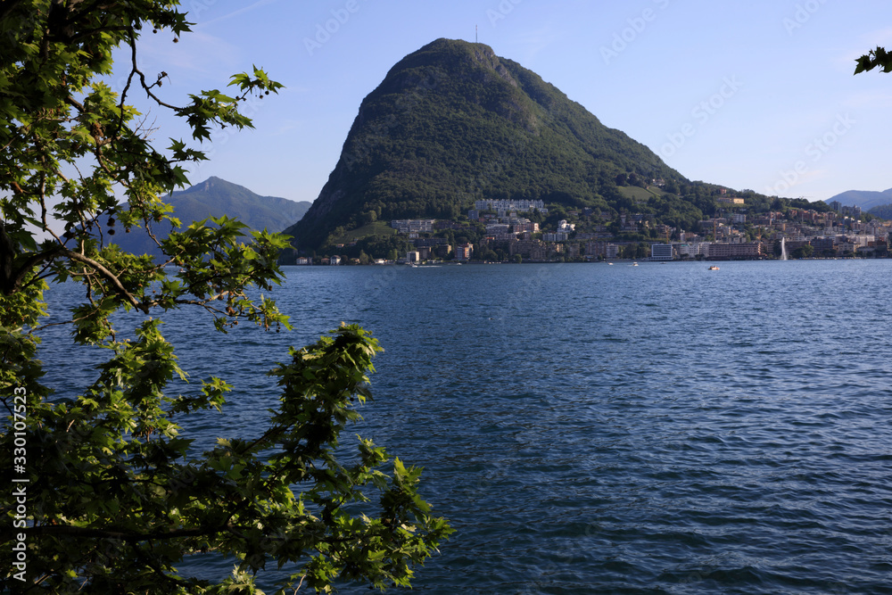 Lugano / Switzerland - June 01, 2019: Lugano lake view, Lugano, Switzerland, Europe Lugano / Switzerland - June 01, 2019: Lugano lake view, Lugano, Switzerland, Europe