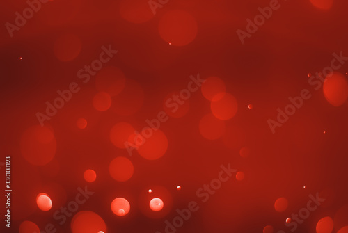 Ruby red bokeh background with soft blur bokeh light effect, background bokeh