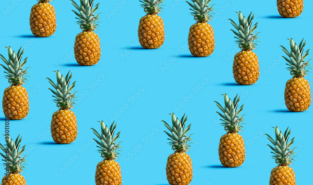Round frame of pineapples on a solid color background Round frame of pineapples on a solid color background