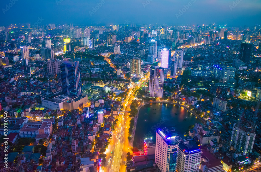 Hanoi, Vietnam - 22th June 2019: Hanoi cityscape at sunset (dusk), from Lotte Observation Deck in Lotte Center, Hanoi. Hanoi, Vietnam - 22th June 2019: Hanoi cityscape at sunset (dusk), from Lotte Observation Deck in Lotte Center, Hanoi.