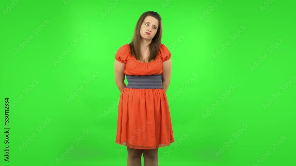 Upset girl shrugging and sighing. Green screen Upset girl shrugging and sighing. Green screen