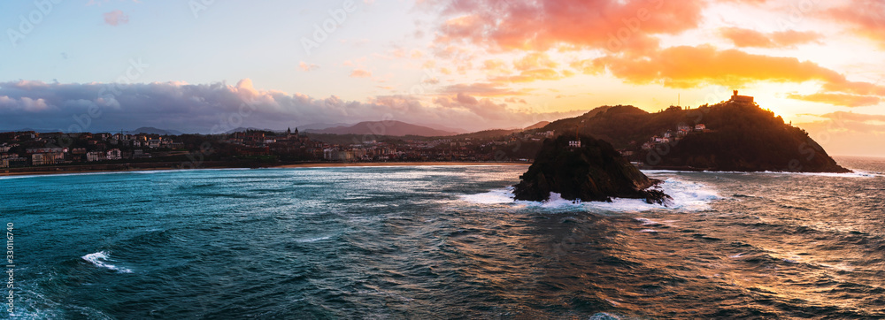 Naklejka premium Panorama of San Sebastian bay at sunset in Basque Country, Spain