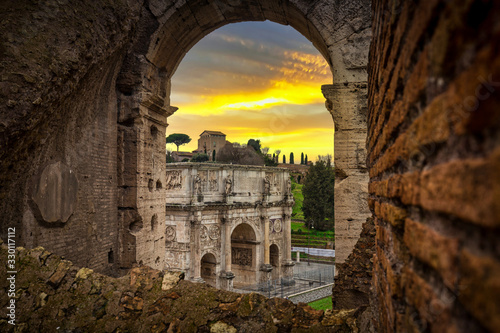 Photography Arch of Constantine and the Colosseum at sunset, Rome. Italy