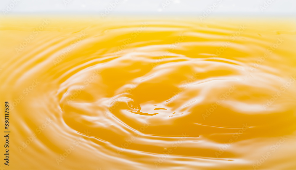 the waves after a few drops of orange juice. the waves after a few drops of orange juice.