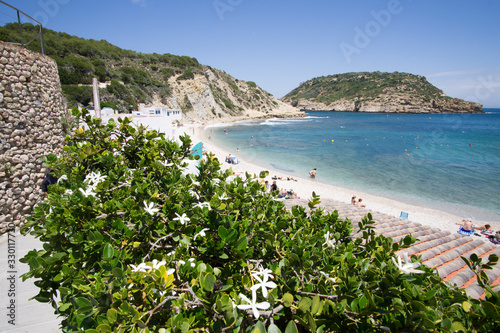 Cala Barraca cove with Potixol island in Javea Xabia Alicante province Spain photo