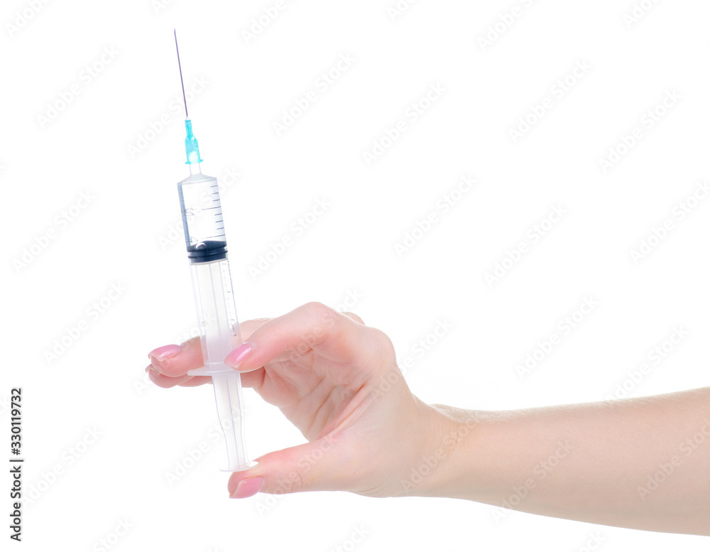 Medicine syringe in hand on white background isolation Medicine syringe in hand on white background isolation