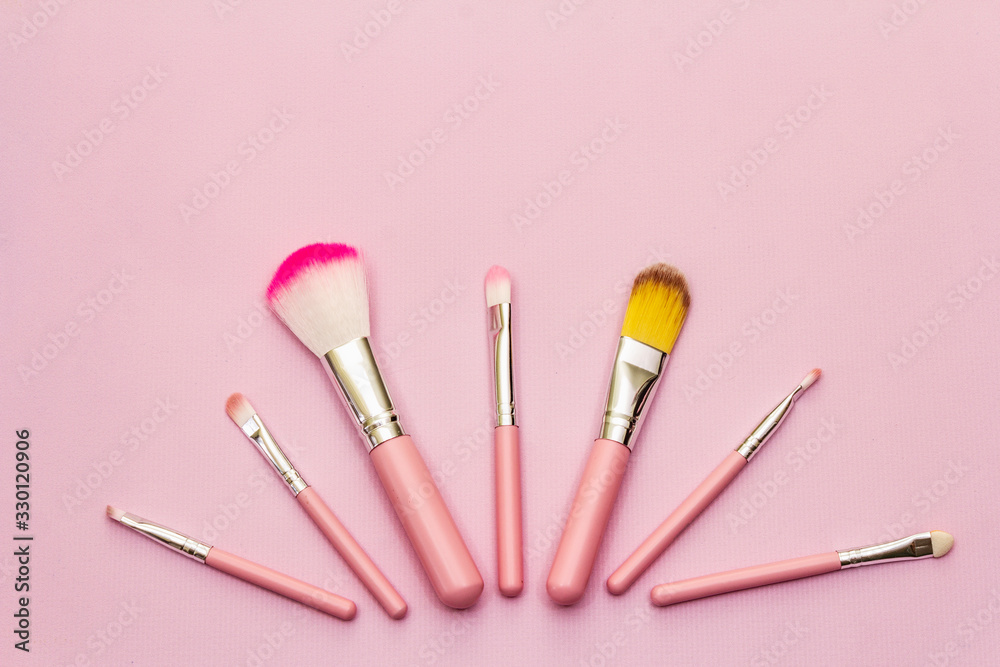 Makeup cosmetic set on pink background Makeup cosmetic set on pink background