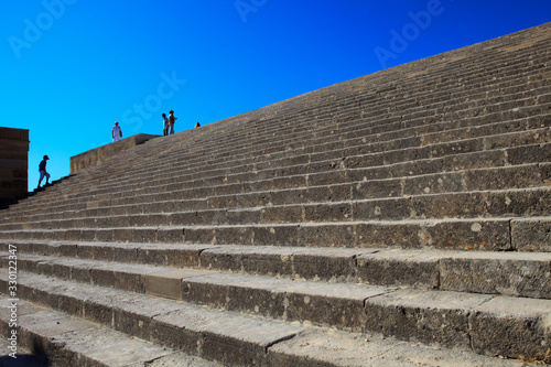 Lindos, Rhodes / Greece - June 23, 2014: Stairs in Lindos acropolis, Rhodes, Dodecanese Islands, Greece.