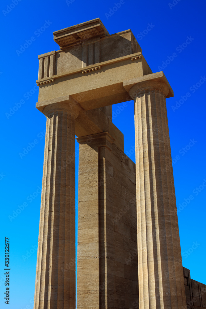 Lindos, Rhodes / Greece - June 23, 2014: Ruins in Lindos acropolis, Rhodes, Dodecanese Islands, Greece.