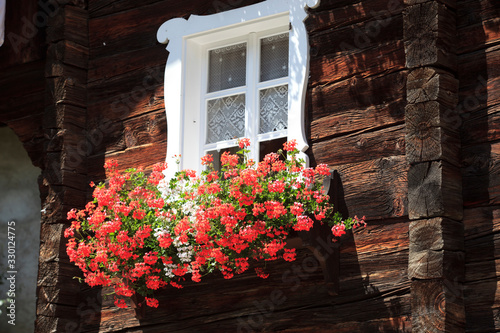 Ponte (VCO), Italy - March 06, 2017: Typical window in a Walser house,  Formazza Valley, Ossola Valley, VCO, Piedmont, Italy