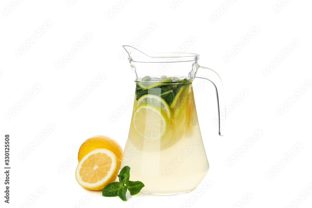Glass jug of lemonade isolated on white background