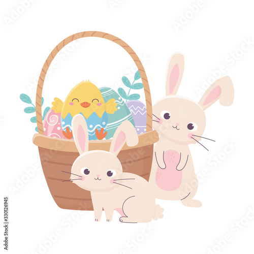 happy easter rabbits chicken in basket with eggs in grass