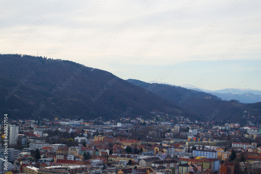 Austria, Graz, mountain landscape and city.