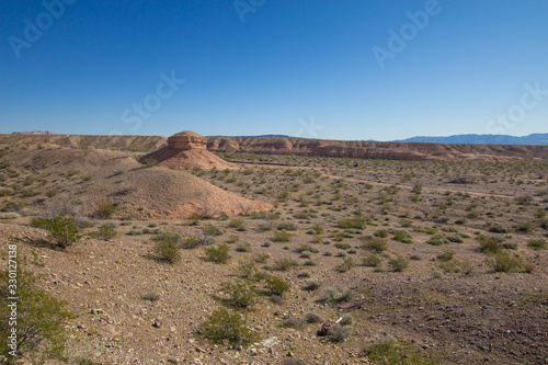 American Wild West Landscape. Desert mountain landscape with large butte and mountain range in the American Southwest desert of Arizona. 