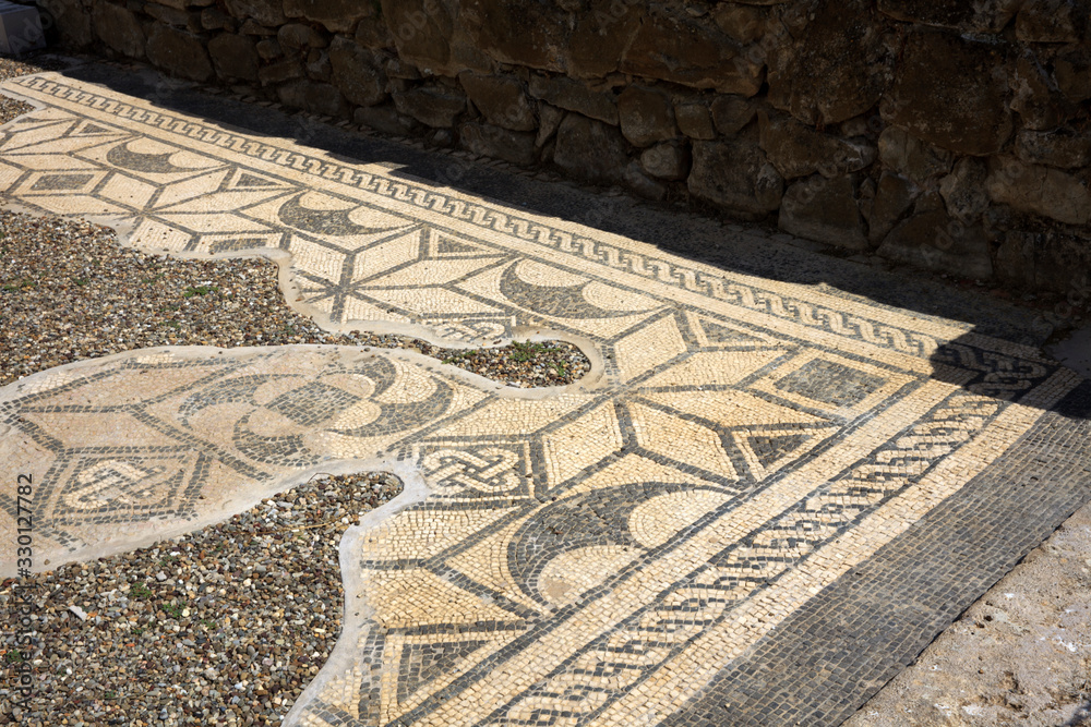 Roselle (GR), Italy - June 19, 2017: Etruscan ruins and mosaic in archaeological site in Roselle, Grosseto, Tuscany, Italy, Europe
