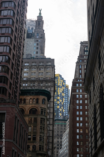 Street with Old and New Buildings and Skyscrapers in Lower Manhattan of New York City