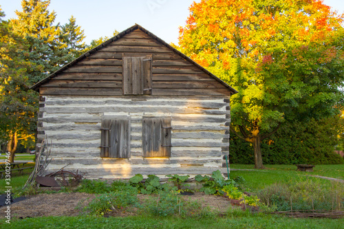 Bild auf Leinwand Historic Log Cabin