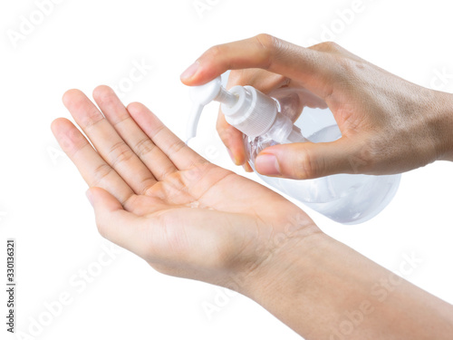 Schilderij op canvas Man hands using wash hand sanitizer gel pump dispenser for protection coronaviru