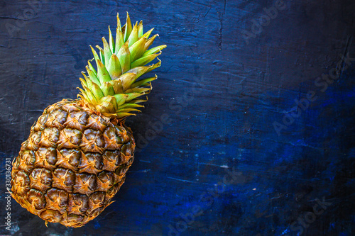 pineapple, ripe and juicy tropical fruit Menu concept food background keto or paleo diet. top view. copy space for text