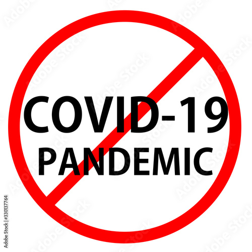 Text COVID-19 PANDEMIC is in red circle With red line projected through the circle. Stop COVID-19 PANDEMIC. Text is in traffic sign.