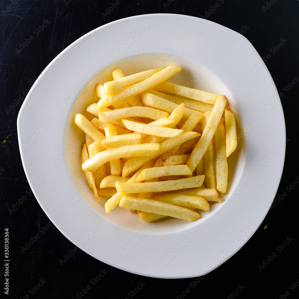 fried chips on a plate fried chips on a plate
